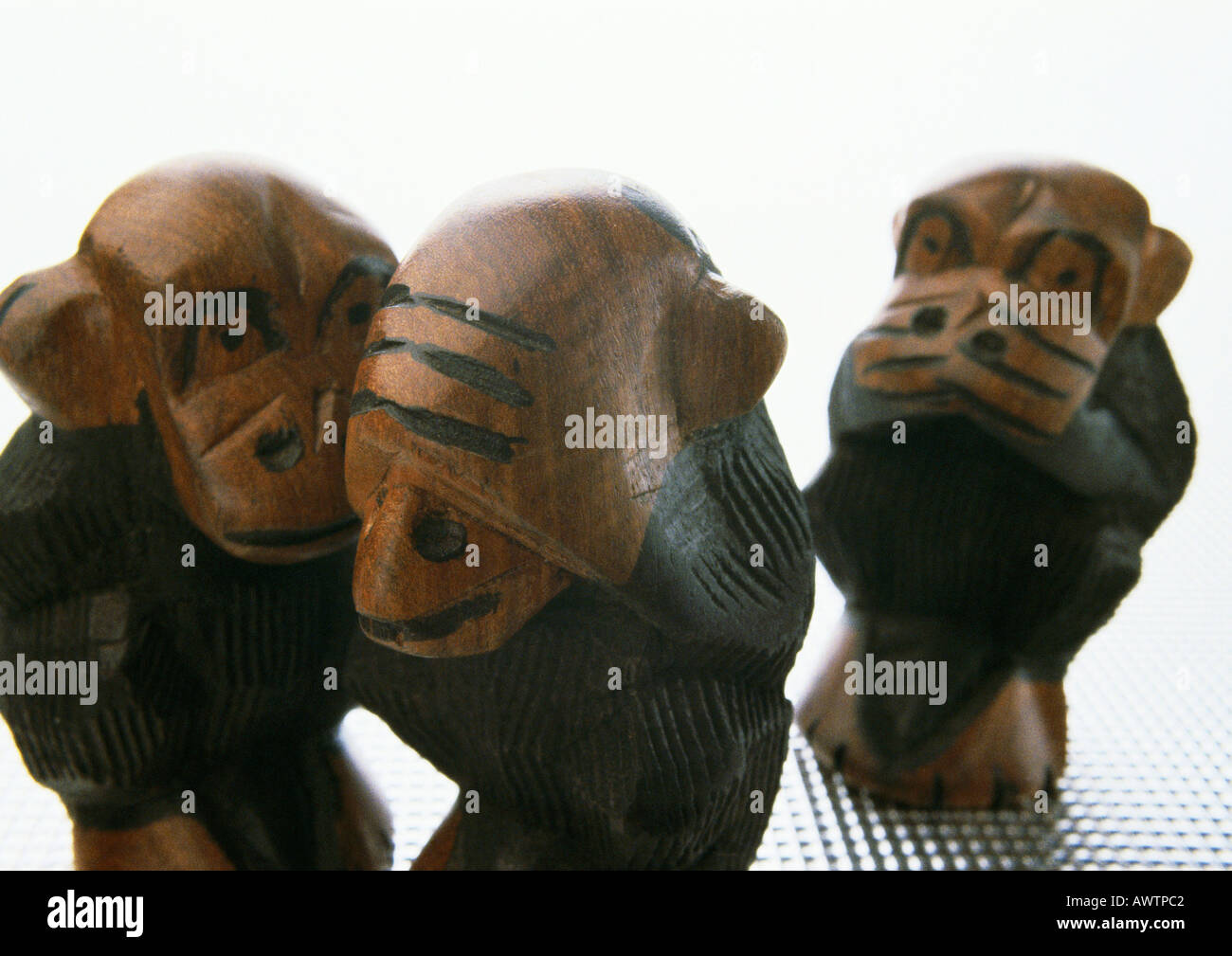 Three wise monkeys, sculpture, closeup Stock Photo Alamy