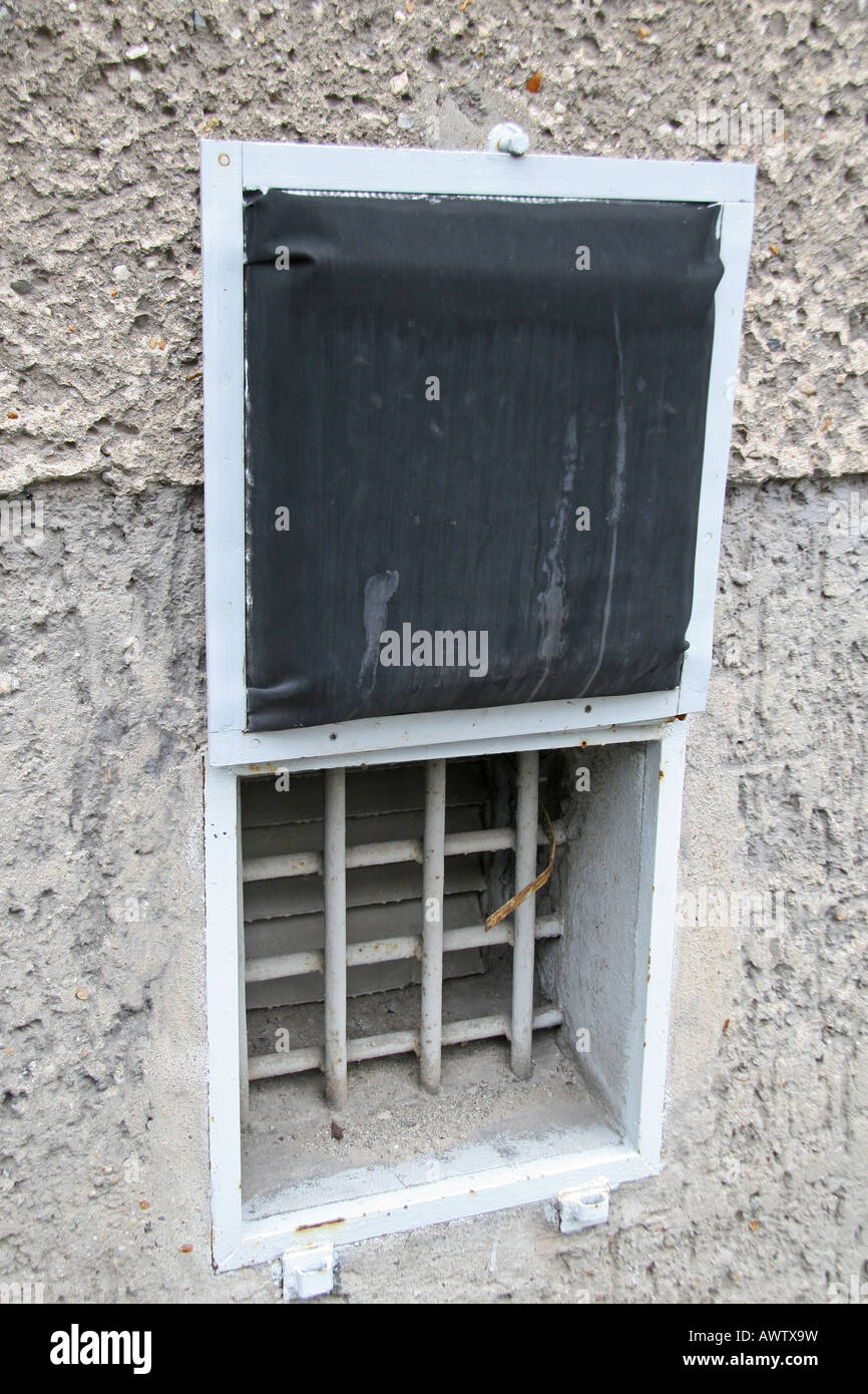 The external window to the cellar padded cells in the Cell wing of the former Cold War Stasi prison Hohenschönhausen, Berlin. Stock Photo