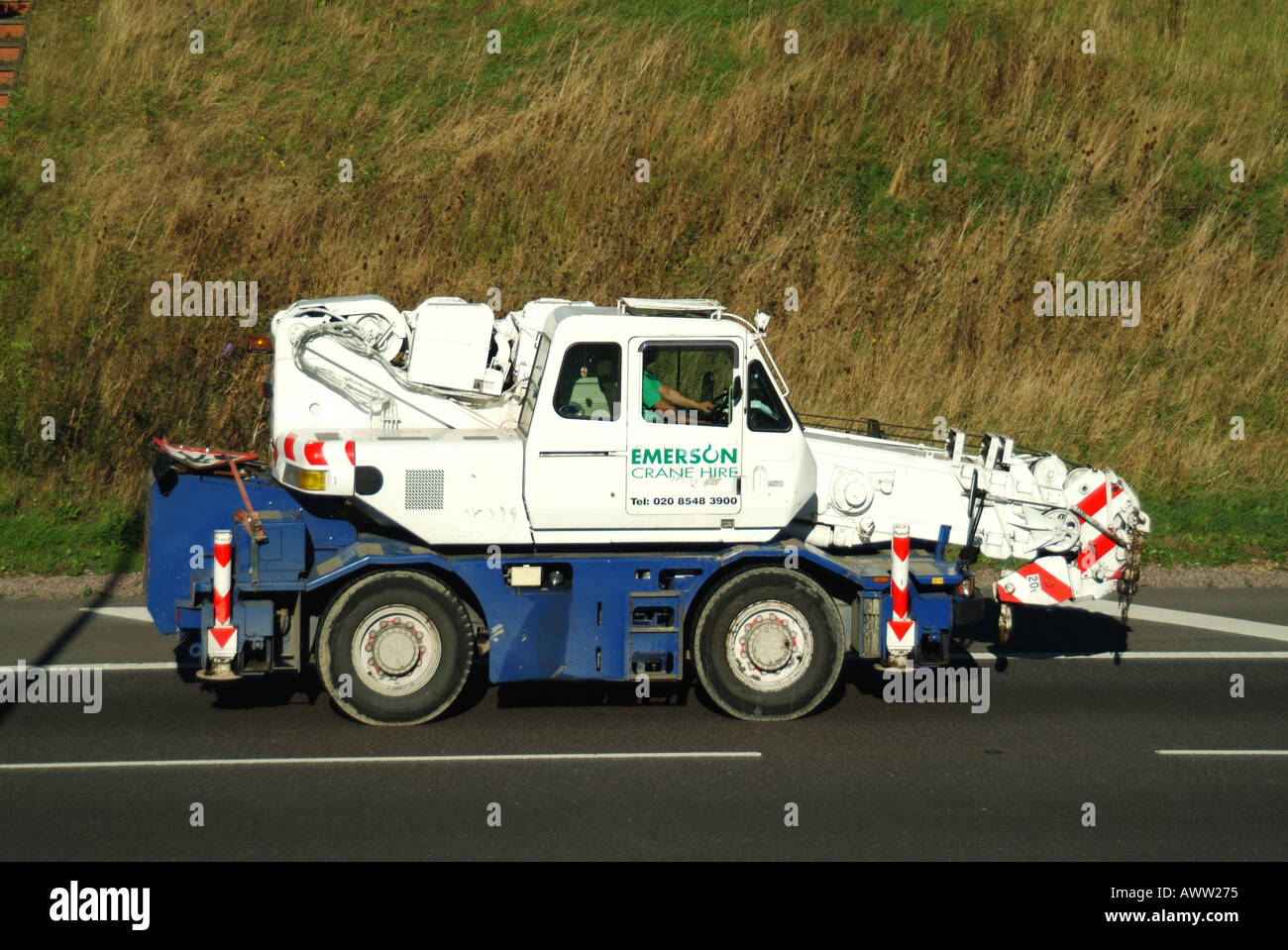 M25 motorway lorry mounted crane Stock Photo Alamy