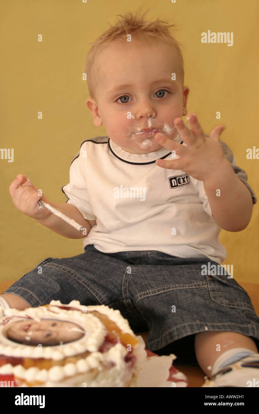 Smudged Little Boy with Birthday Cake Stock Photo