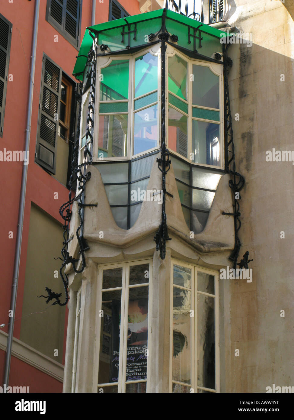 Enclosed glass balcony, or bay window, with green roof, Palma, Mallorca, Spain Stock Photo