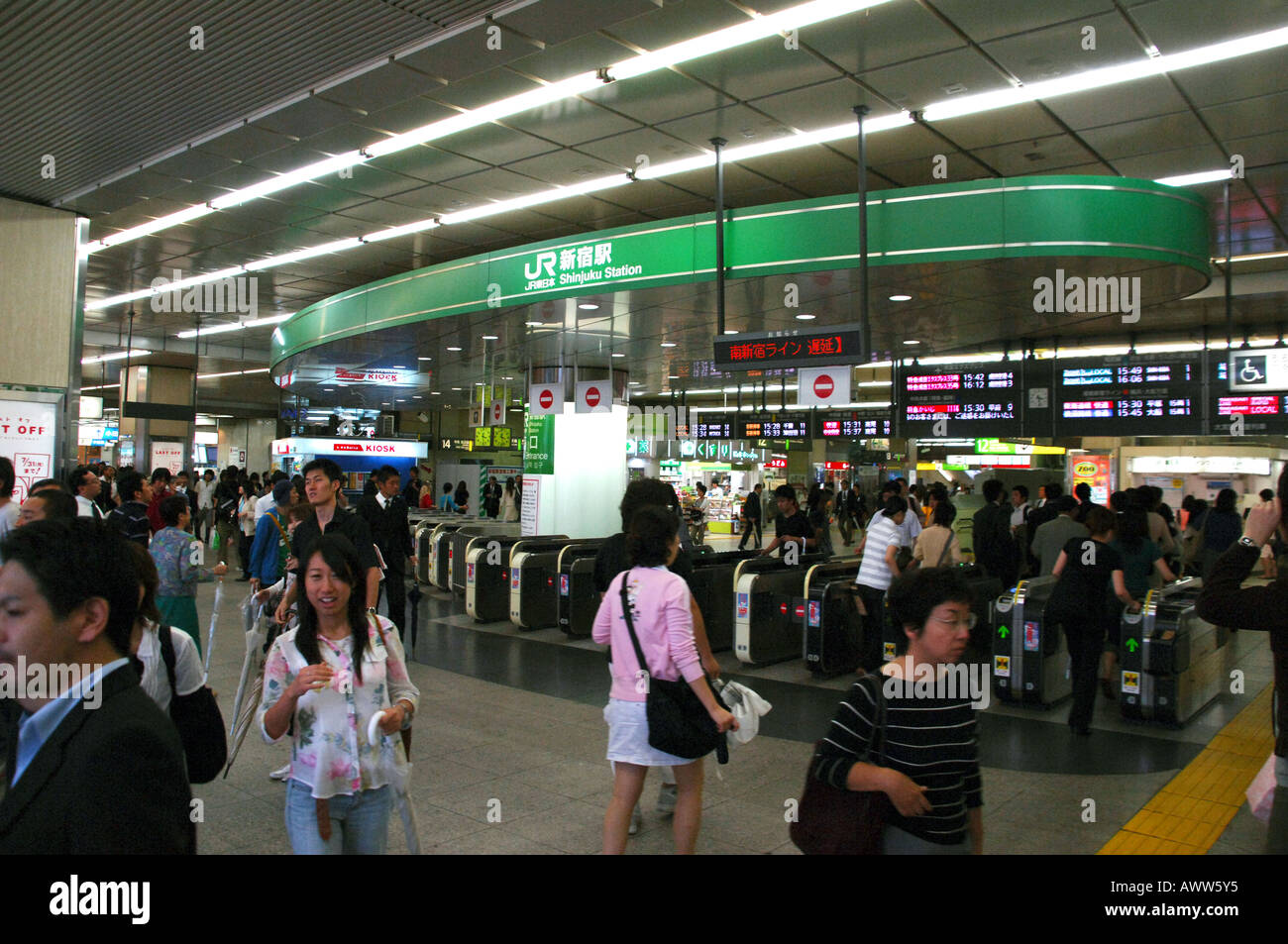 Crowded subway ticket hall, Shinjuku subway station,  JR Yamanote Line subway system, Tokyo Japan Stock Photo