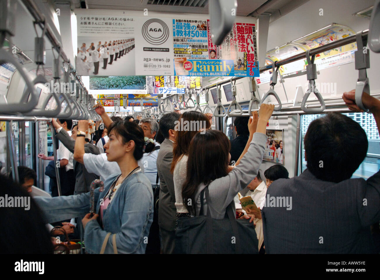 Passengers on the JR Yamanote Line subway system, Tokyo Japan Stock Photo