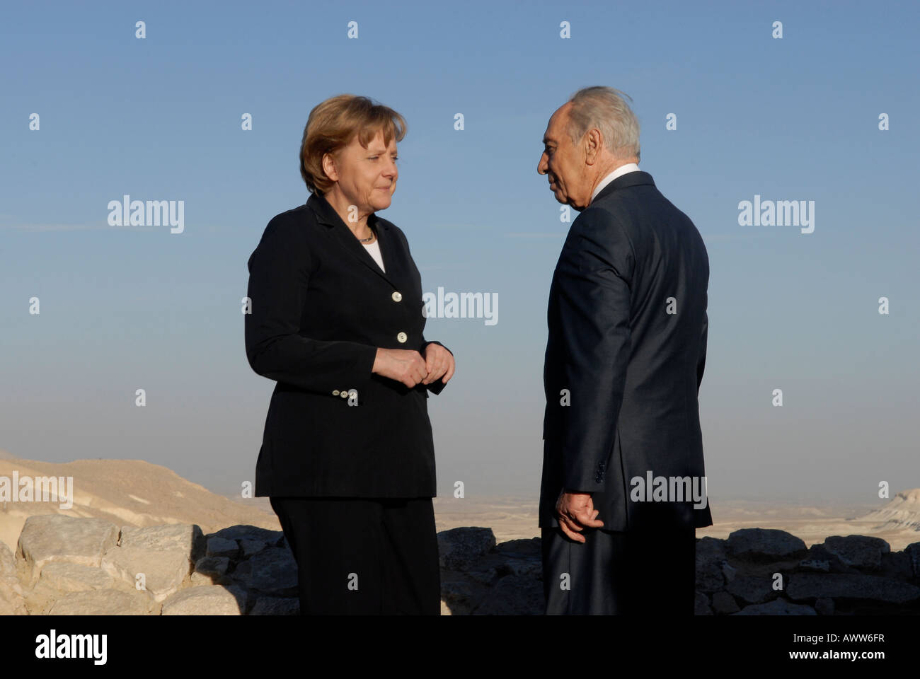 German chancellor Angela Merkel with Israeli president Shimon Peres in the Negev desert, Israel Stock Photo