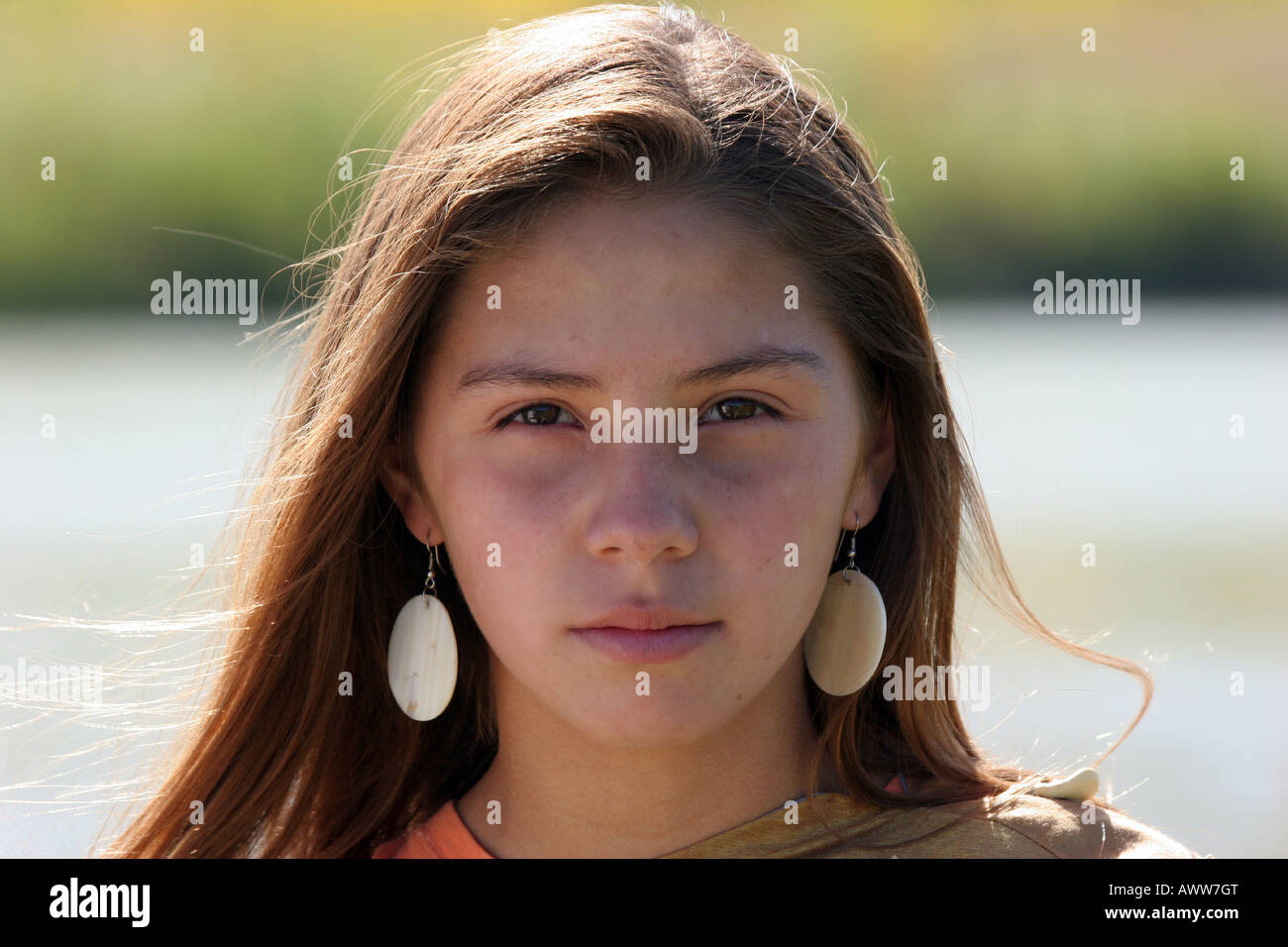 A Young Native American Indian Teenager Girl Walking Along A Ri