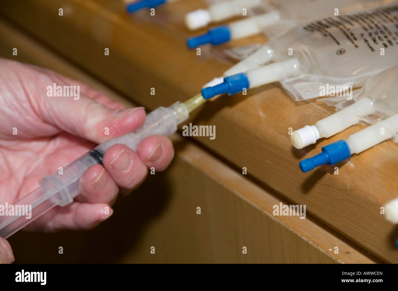 Nurse preparing iv drip hires stock photography and images Alamy
