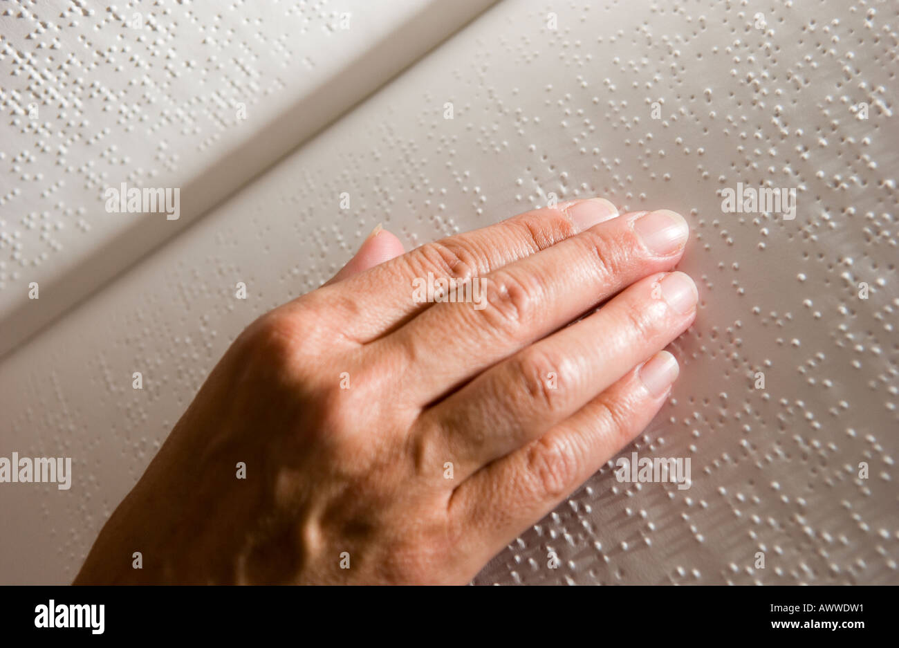 blind-person-reading-braille-stock-photo-alamy