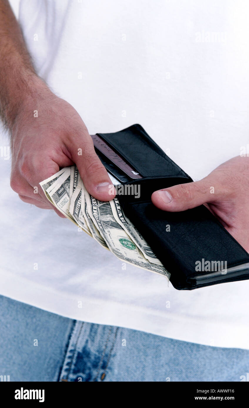 Putting Wallet Chris riches hi-res stock photography and images - Alamy