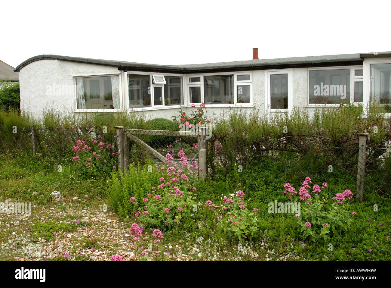 UK England West Sussex Pagham seafront bungalow built from Railway