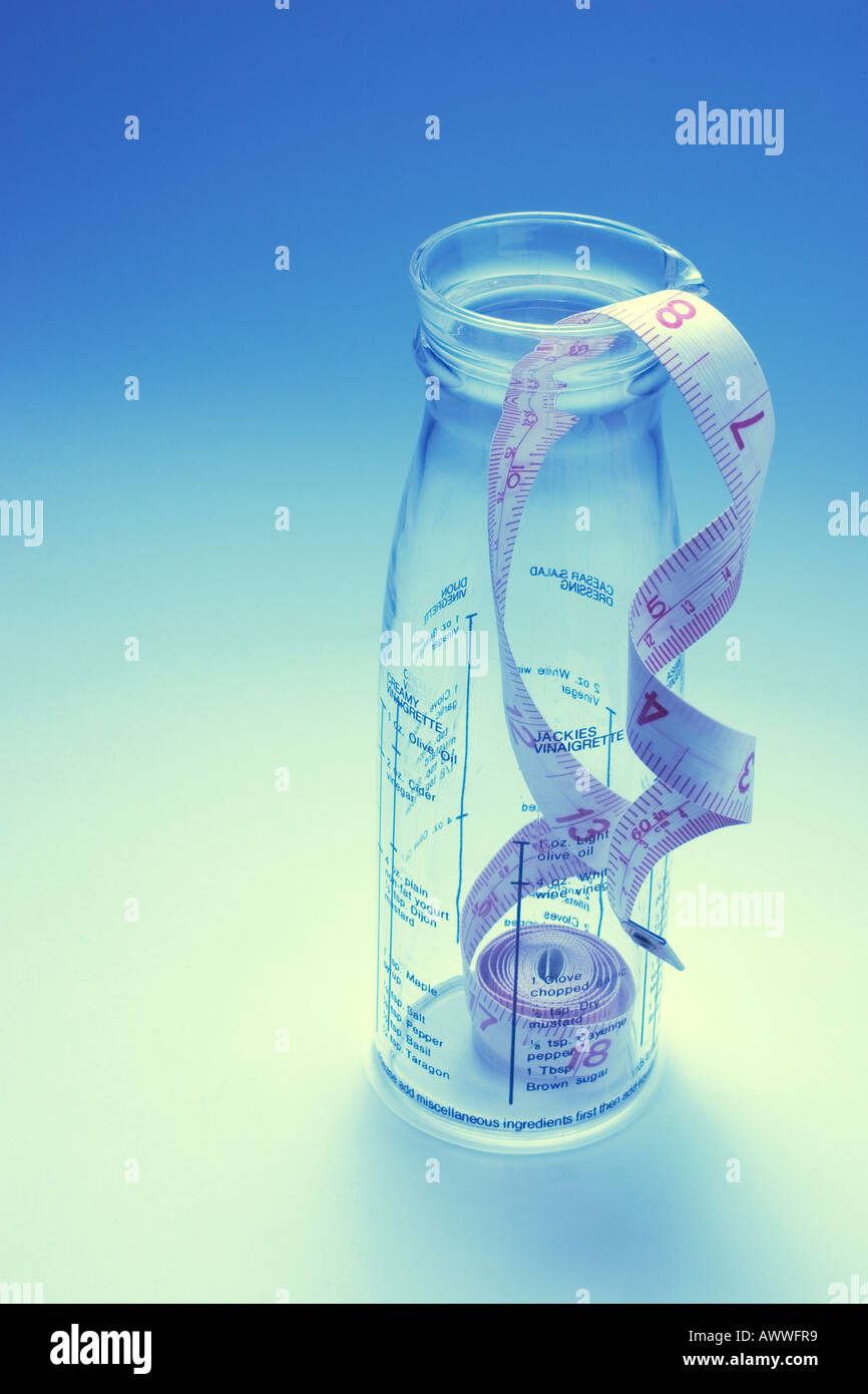 Tape Measure in Glass Bottle Stock Photo Alamy