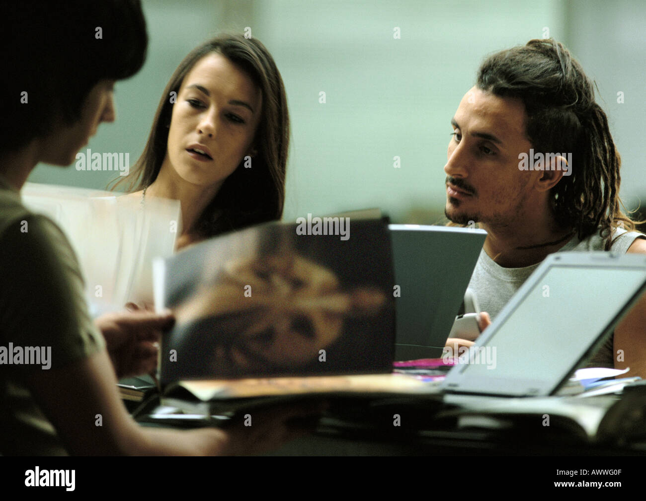 Men and women working together Stock Photo