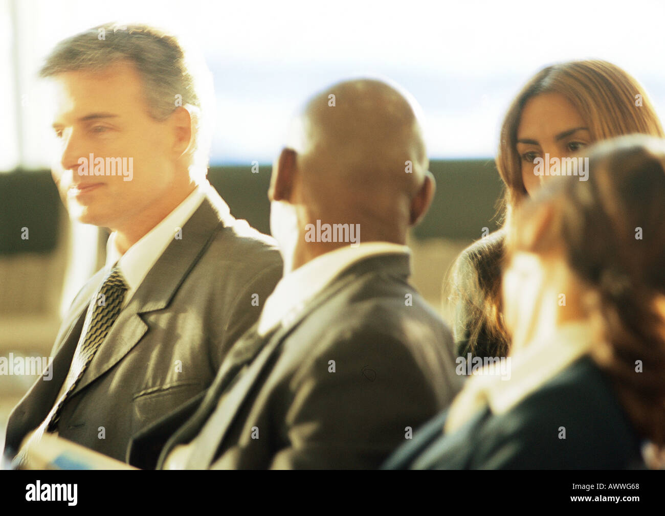 Business people sitting and talking to each other. Stock Photo
