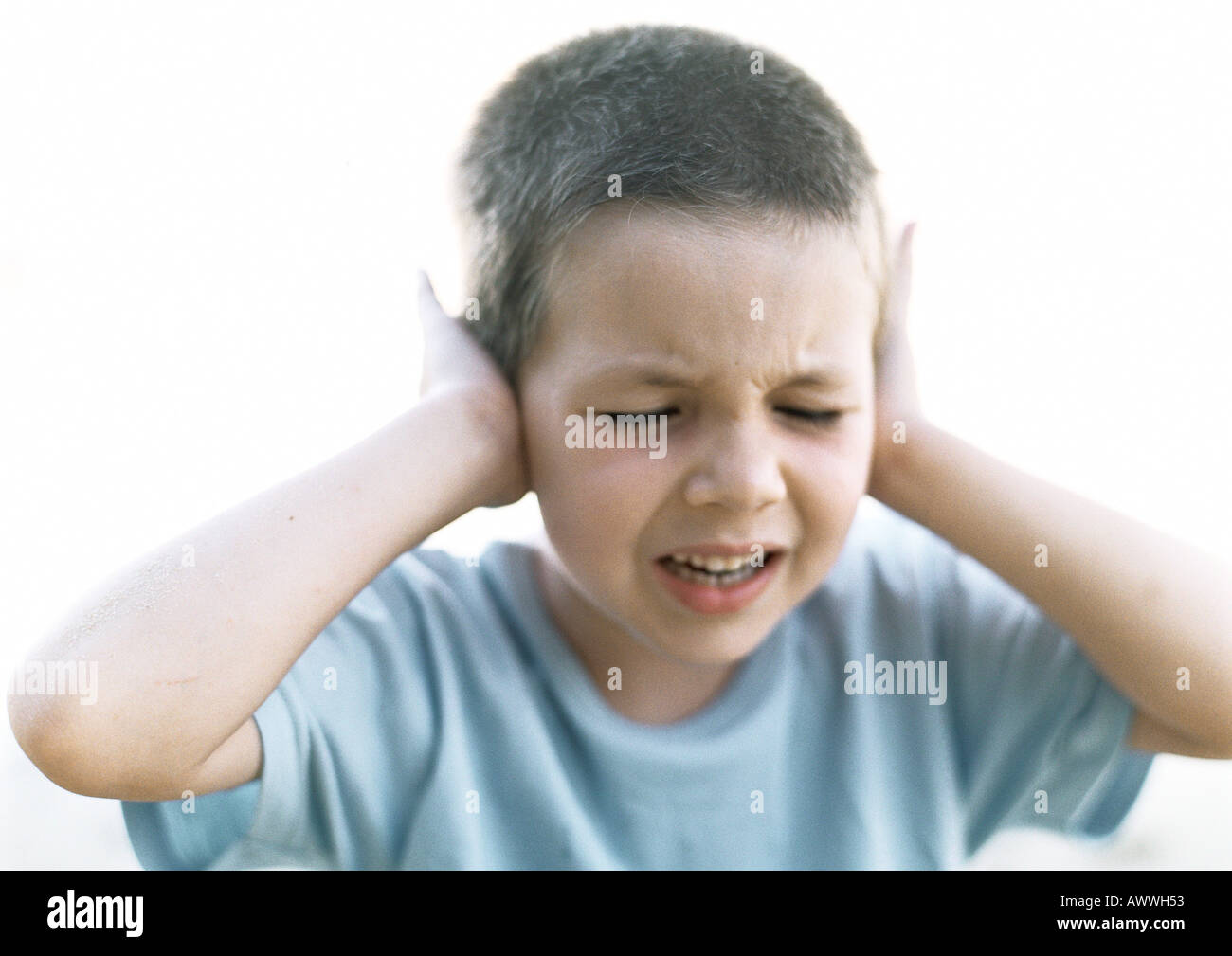Child with hands over ears hires stock photography and images Alamy