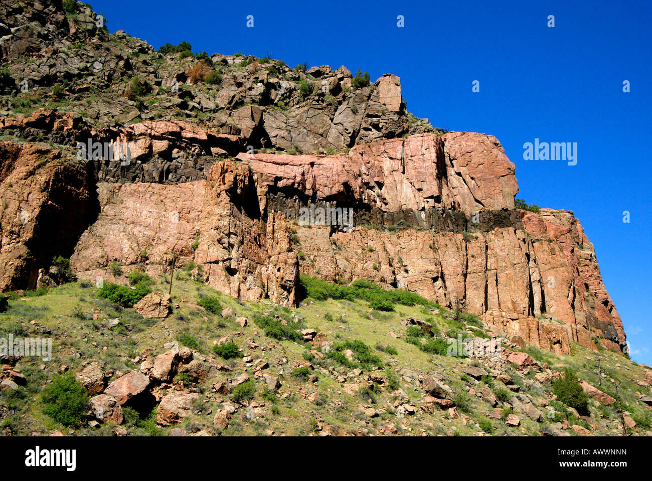 Different colored layers of stone make up the walls of Royal Gorge ...