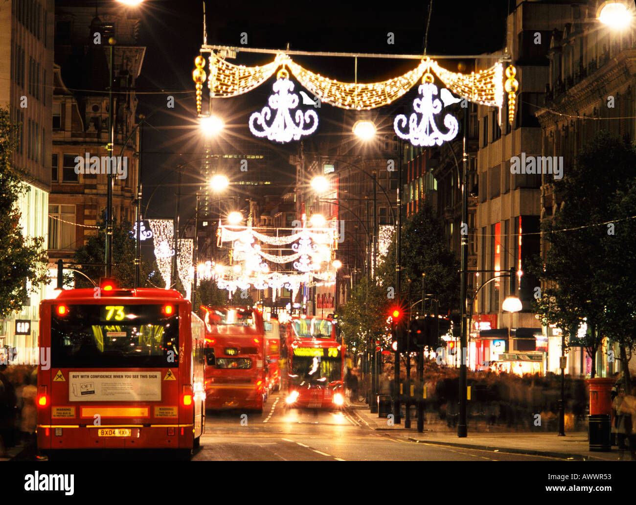 The attractive Christmas Lights and Decorations in busy Oxford Street  in London Stock Photo