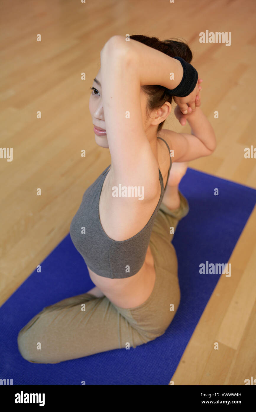 Asian woman stretching body yoga hi-res stock photography and images ...