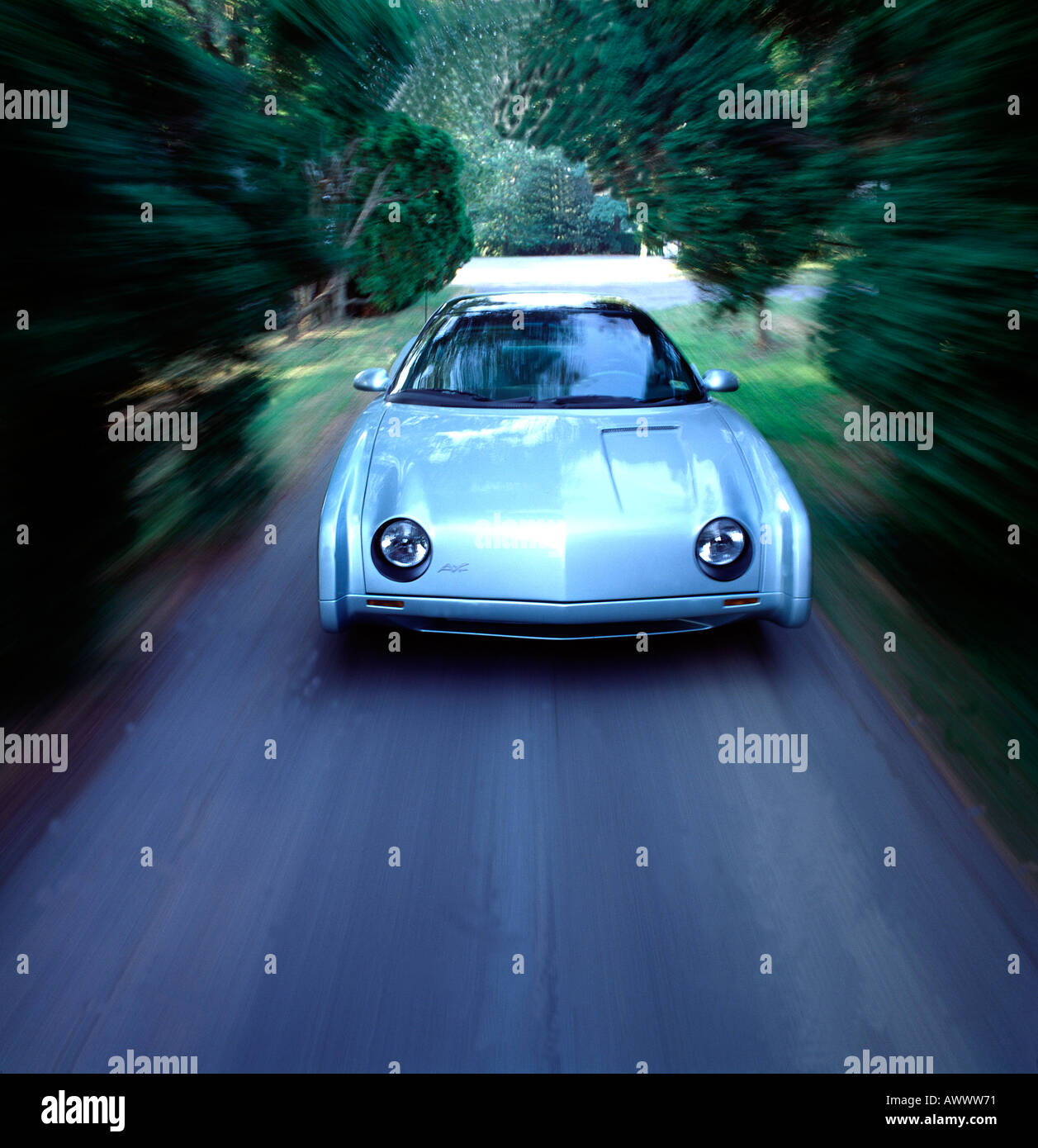Studebaker Avanti in motion on country road 1960's Stock Photo