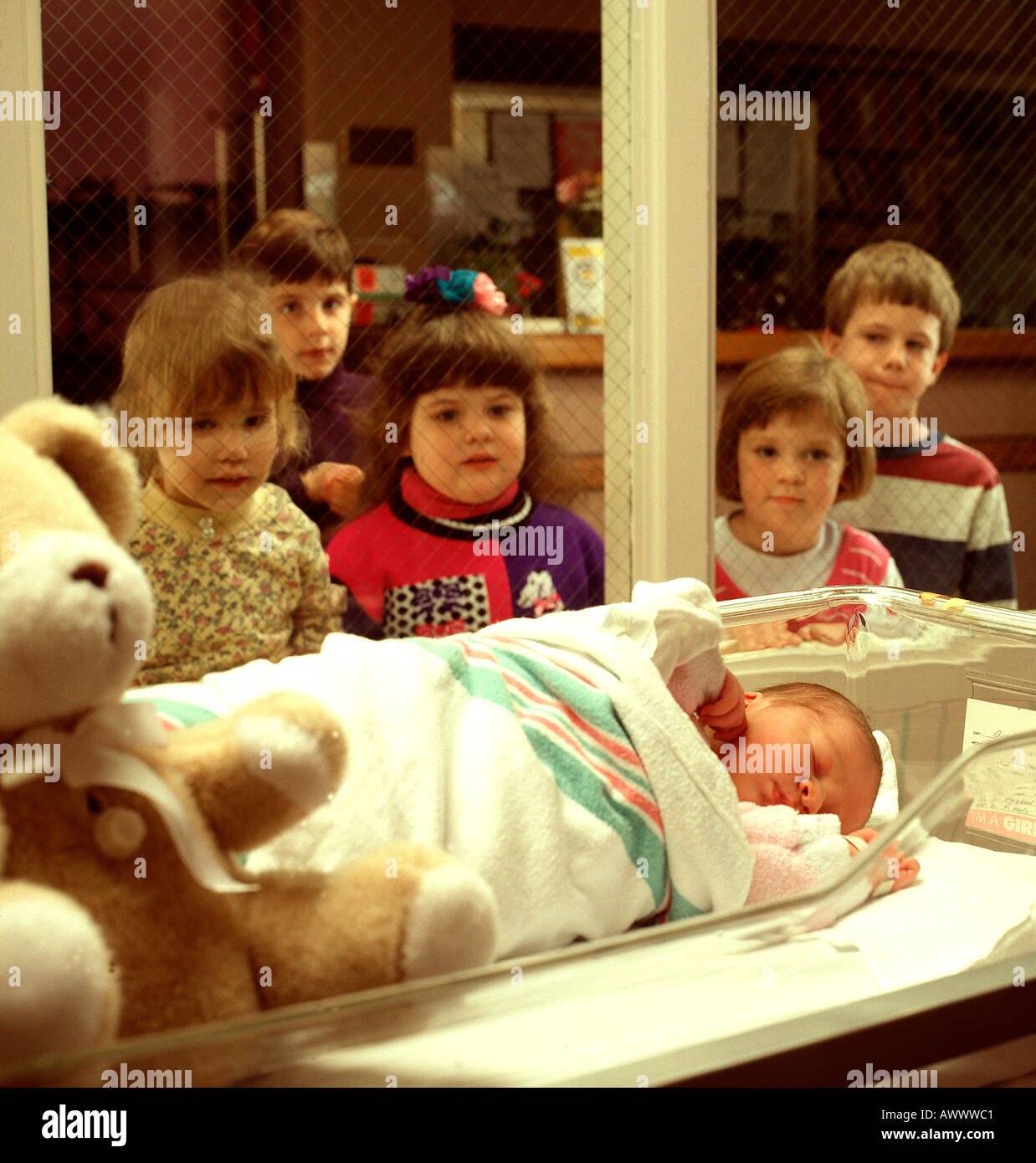 group of children view new born baby in hospital Stock Photo - Alamy