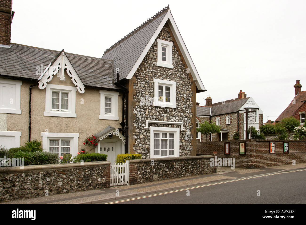 UK West Sussex Littlehampton Church Street stone faced cottage next to