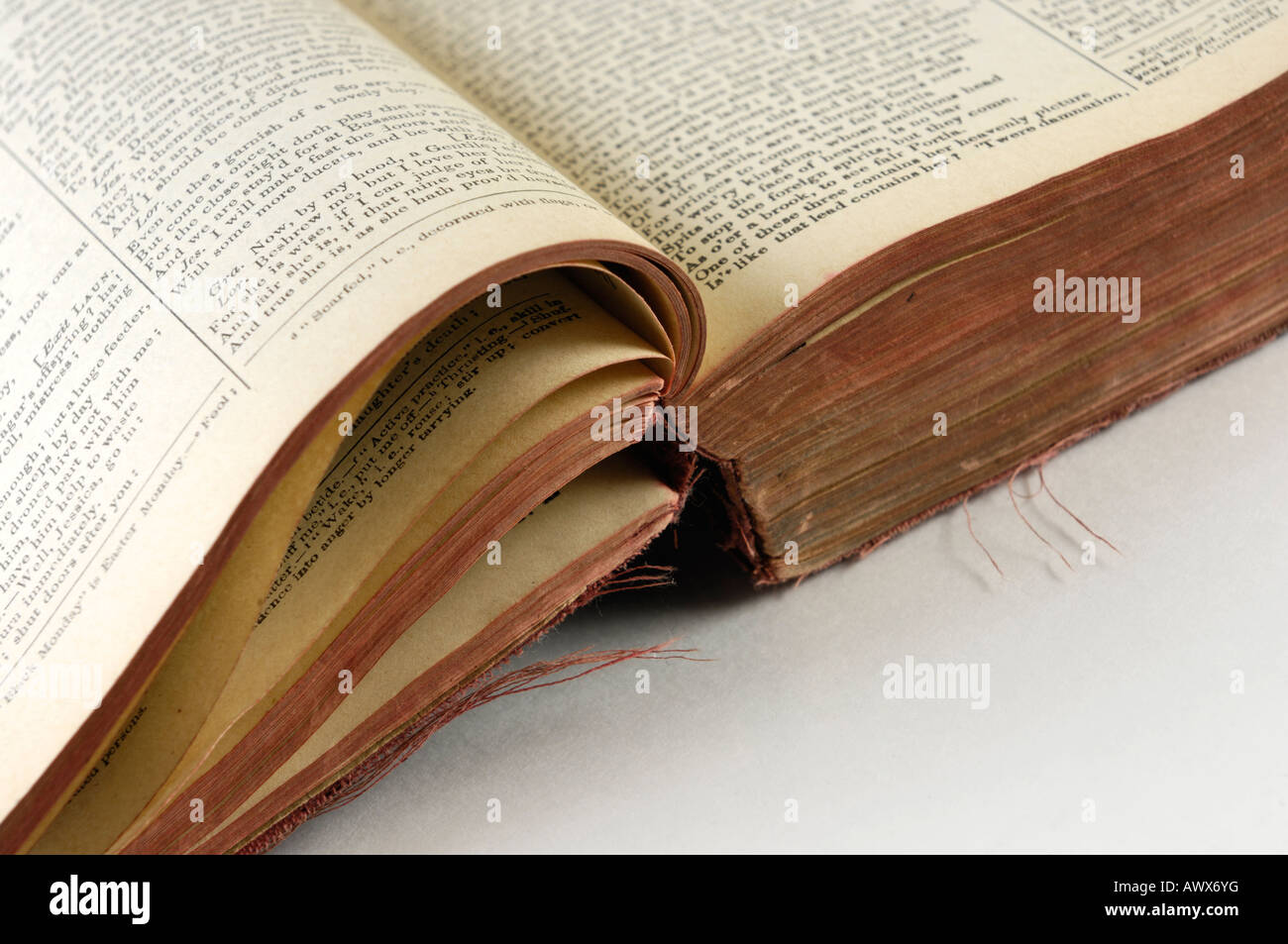 Old open tattered book pages Stock Photo