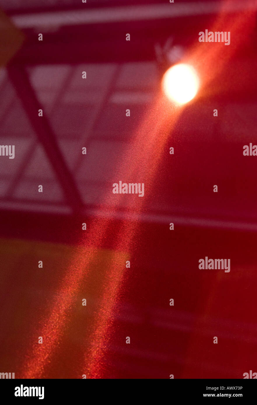 Spotlight through curtain Stock Photo