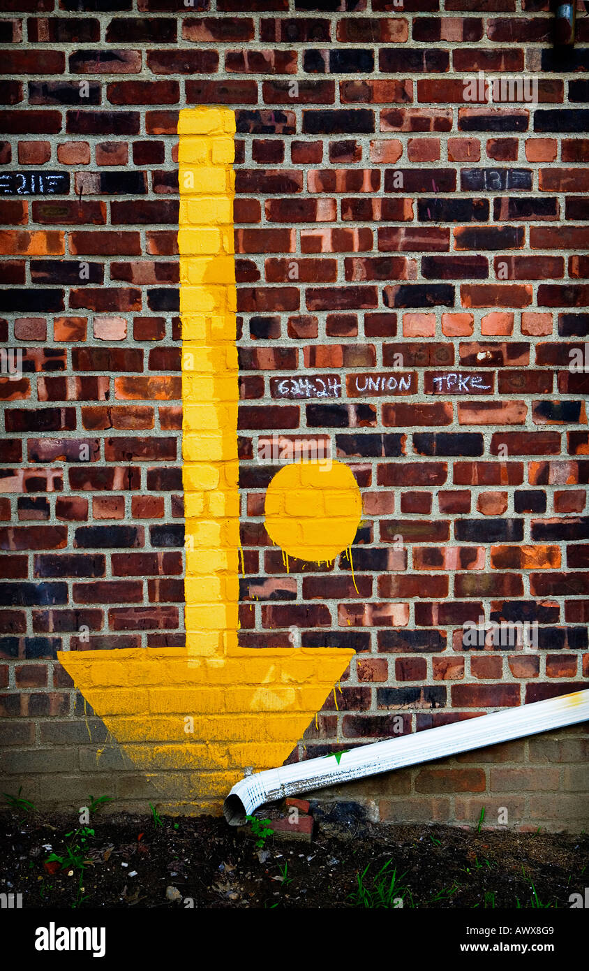 brick wall with arrow Stock Photo