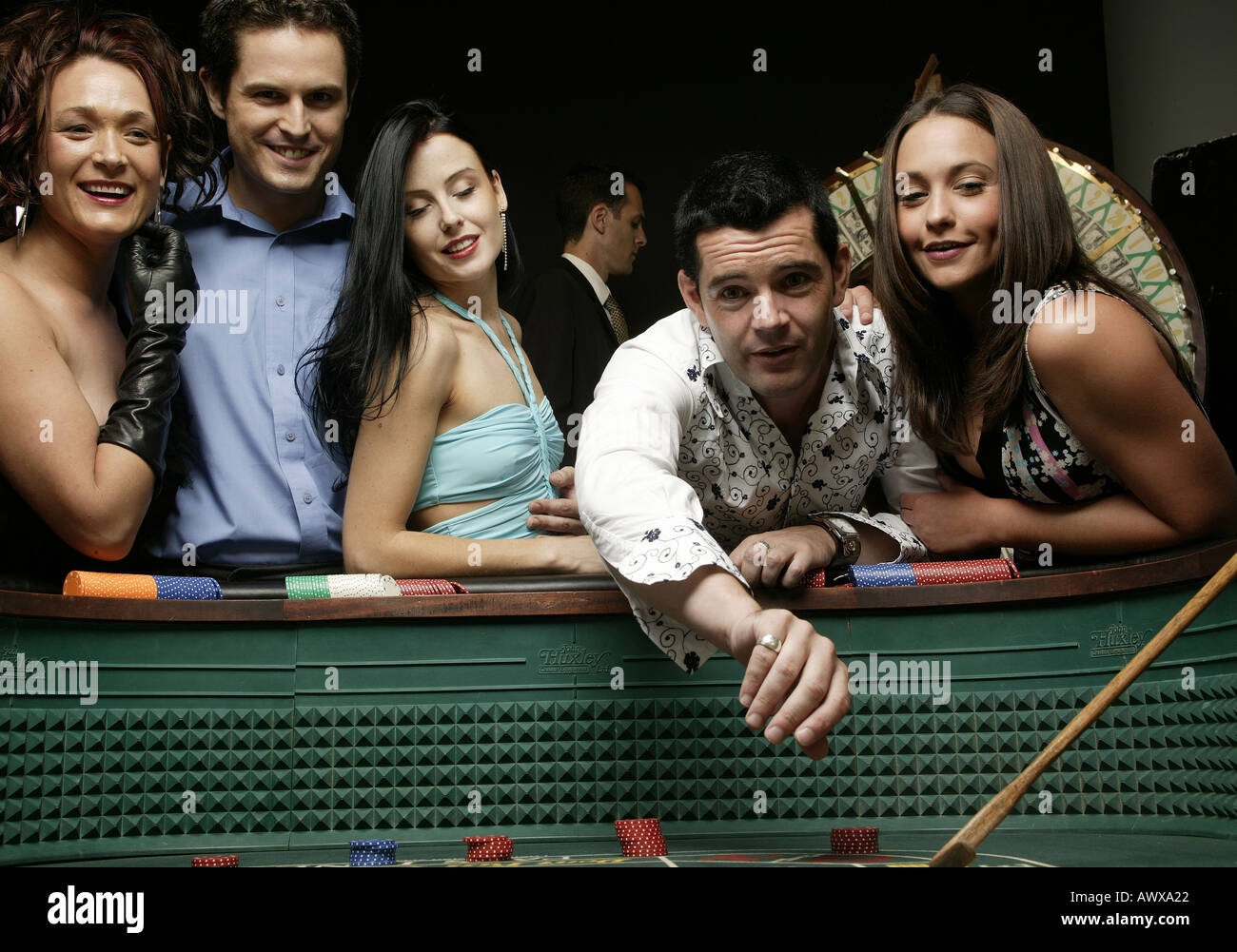Throwing craps dice Stock Photo Alamy