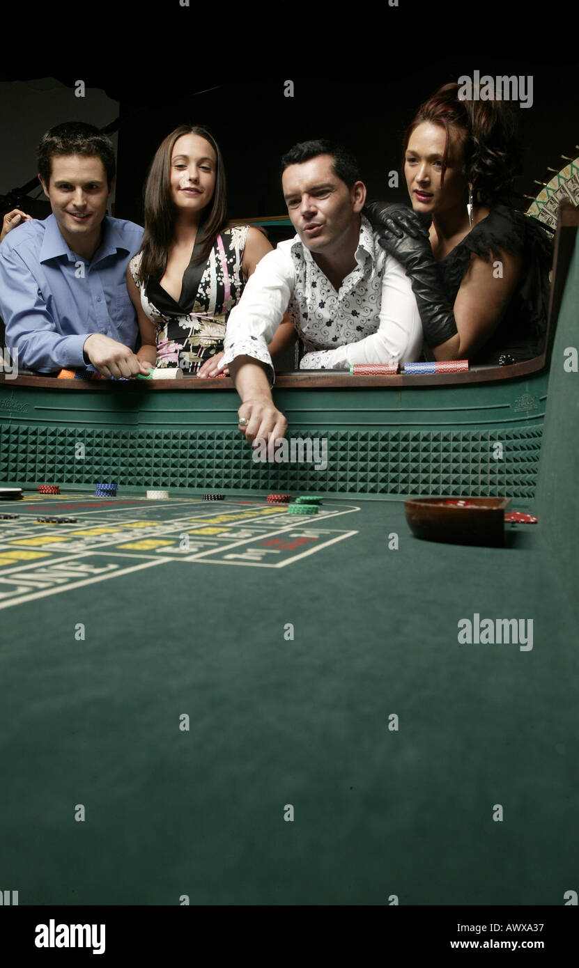 Throwing craps dice Stock Photo Alamy