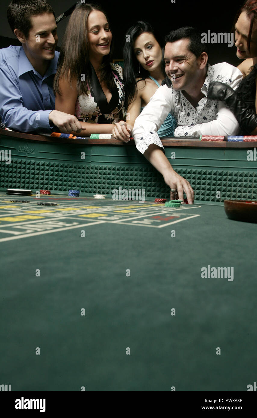 Man throwing craps dice Stock Photo Alamy