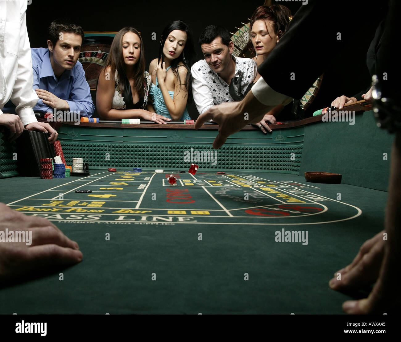 Throwing craps dice Stock Photo Alamy