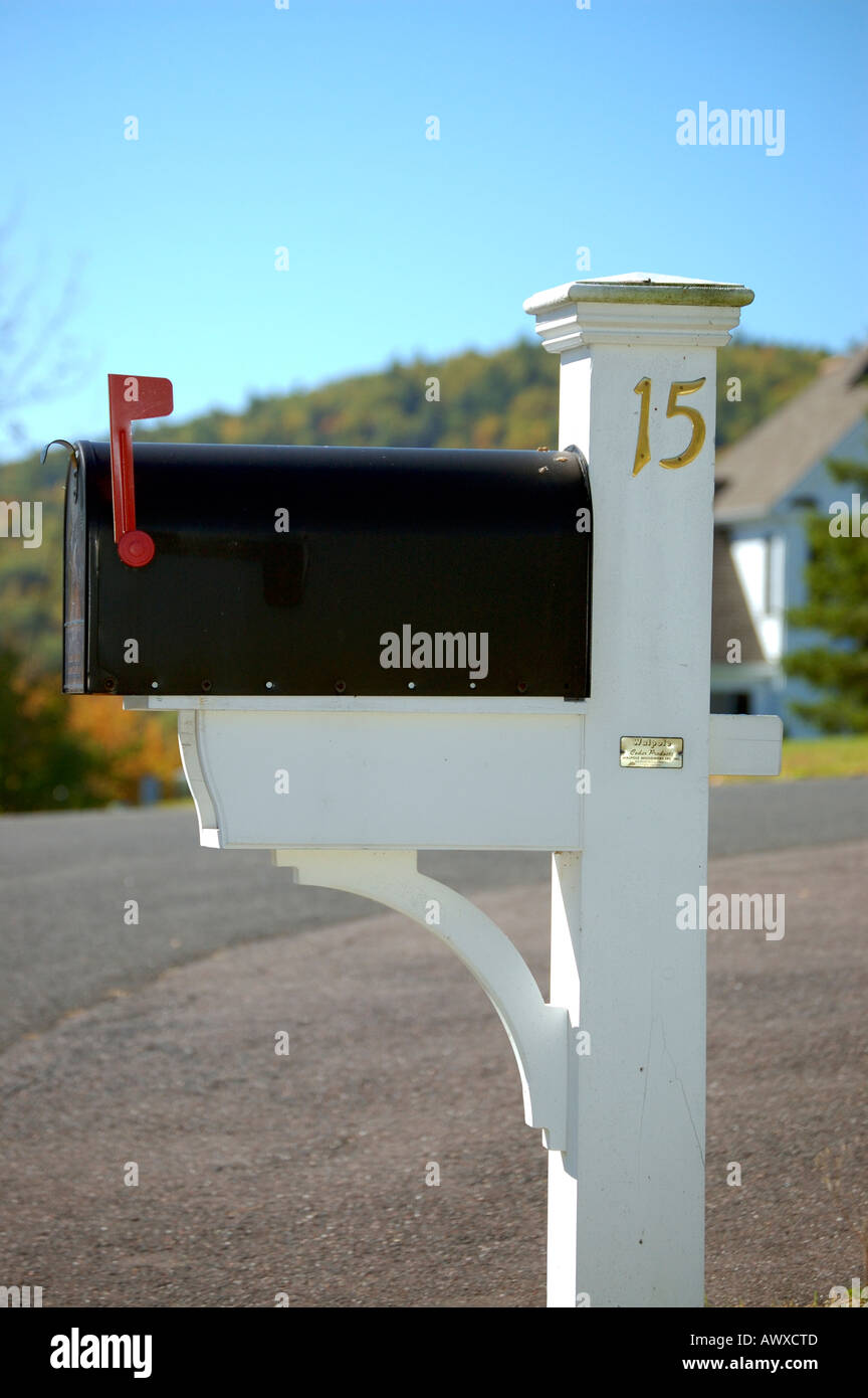 US Mailbox with flag raised showing that there is mail to be collected