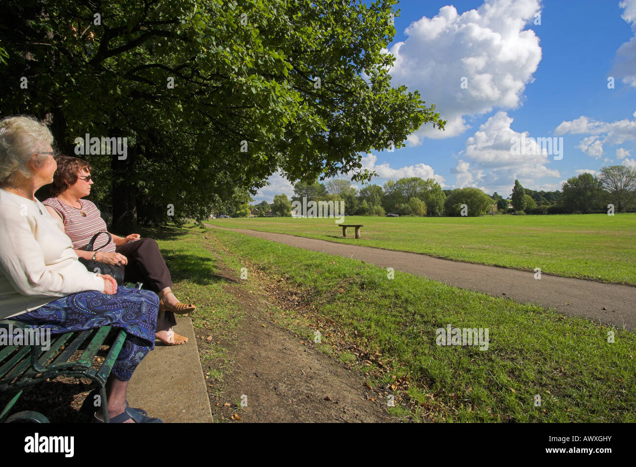 "Two women" admiring village green "Theydon Bois" UK Stock Photo Alamy