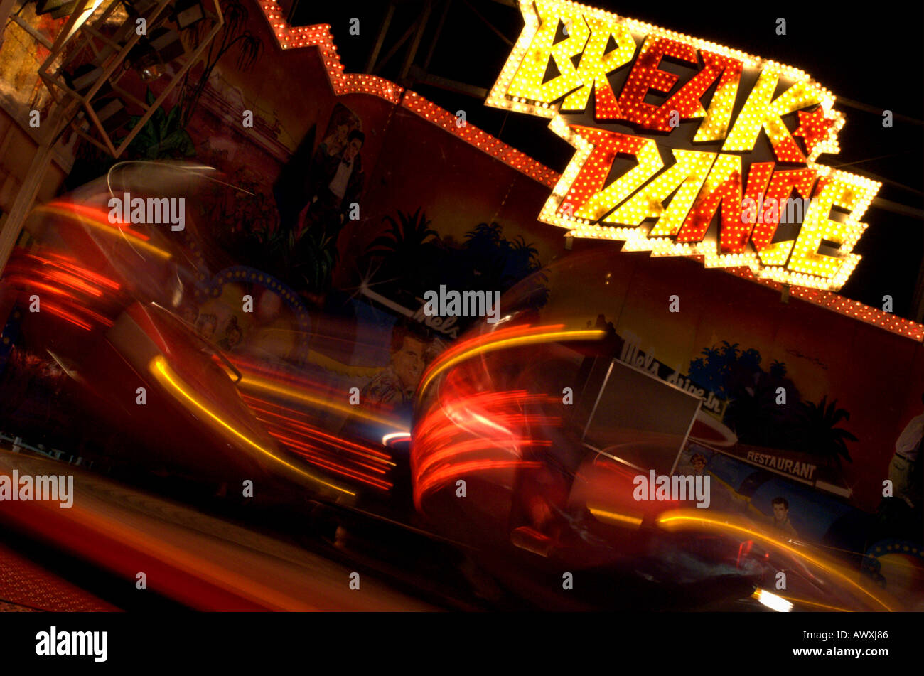 Spinning cars on a carnival ride Stock Photo Alamy