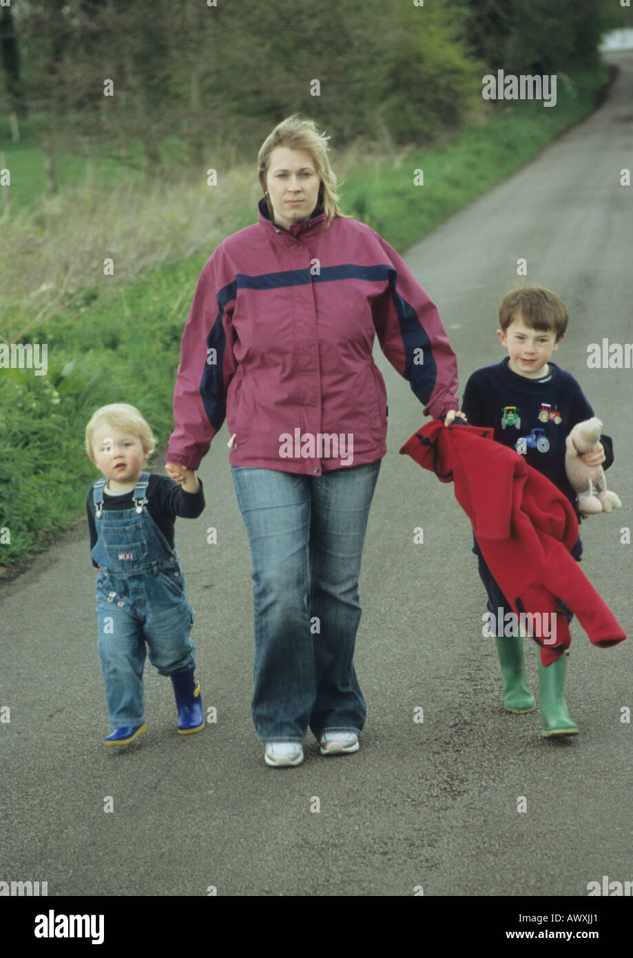 Mother And Children On Country Walk In Suffolk Uk Stock Photo