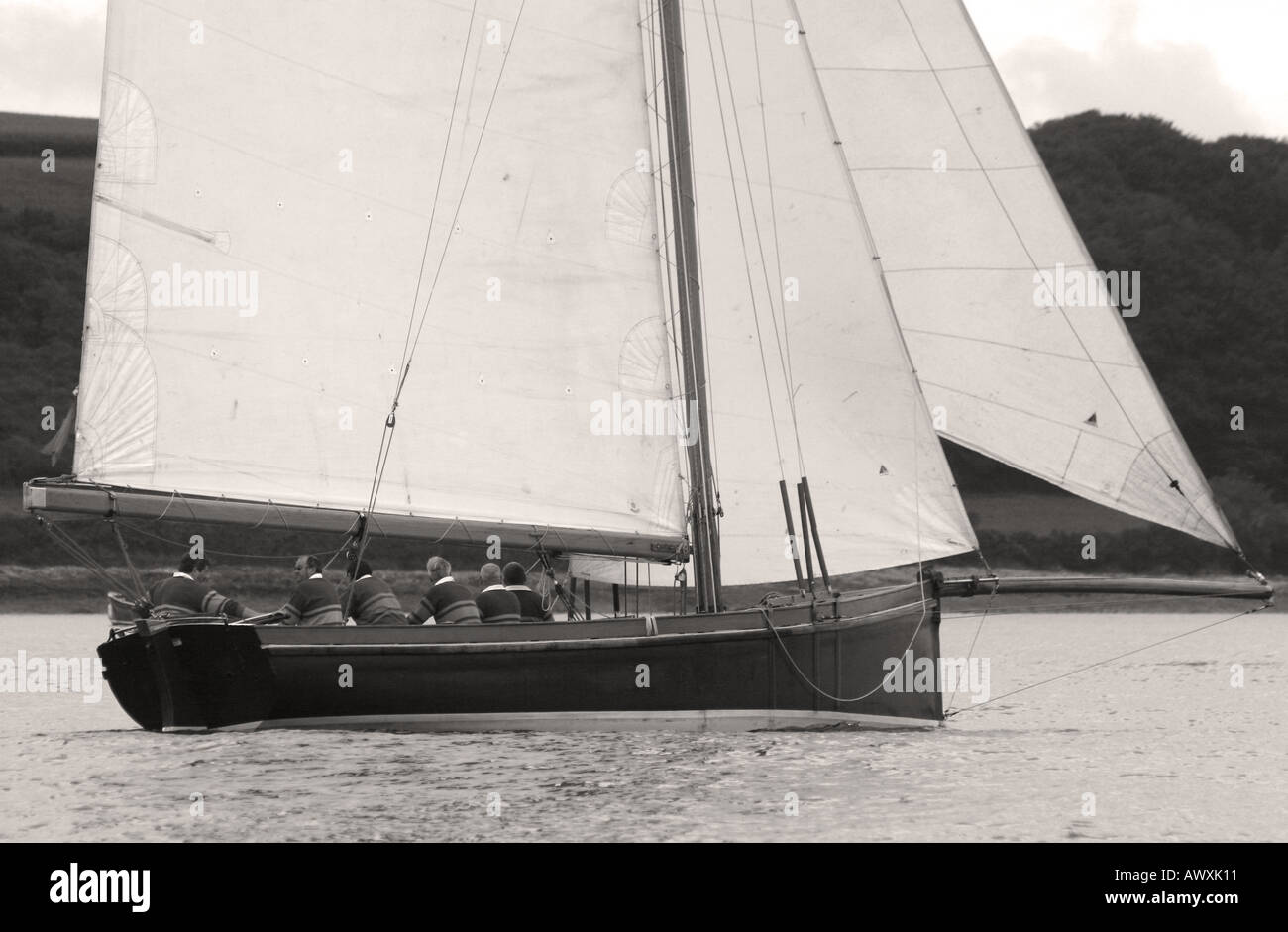 Falmouth Working Boat sailing in Falmuth Harbour, Cornwall, England, Black and White Stock Photo