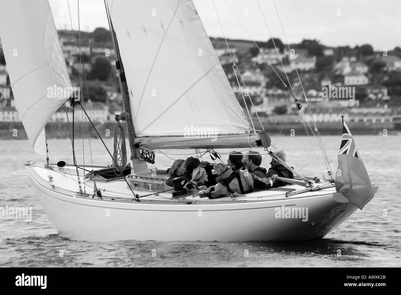 Classic 8 metre sailing yacht, under sail, Cornwall, England. Black and White Stock Photo
