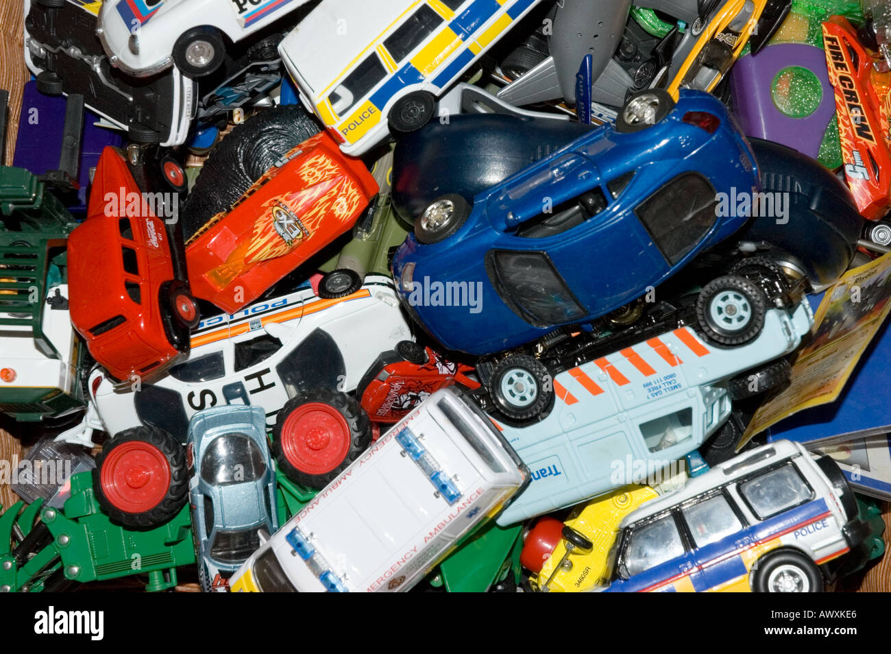 A box of toy cars showing an assortment of models Stock Photo