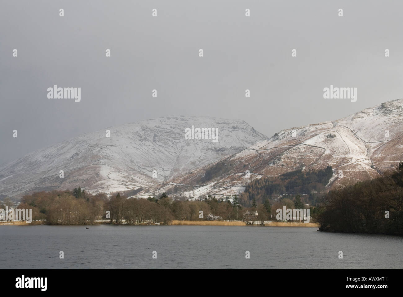 More snow moving in over Stone Arthur and Heron Pike near Grasmere Lake District Cumbria Stock Photo
