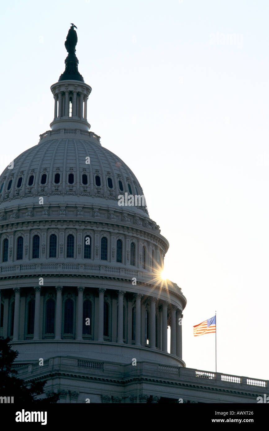 Washington, D.C., USA, U.S. Capitol dome and American flag with late afternoon sun Stock Photo