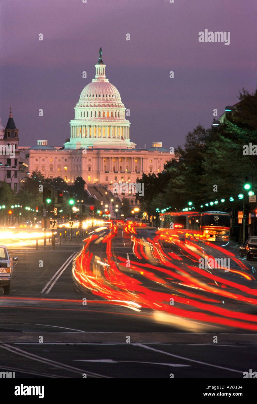 Washington D C USA U S Capitol west facade and Pennsylvania Avenue with car light streaks at sunset Stock Photo
