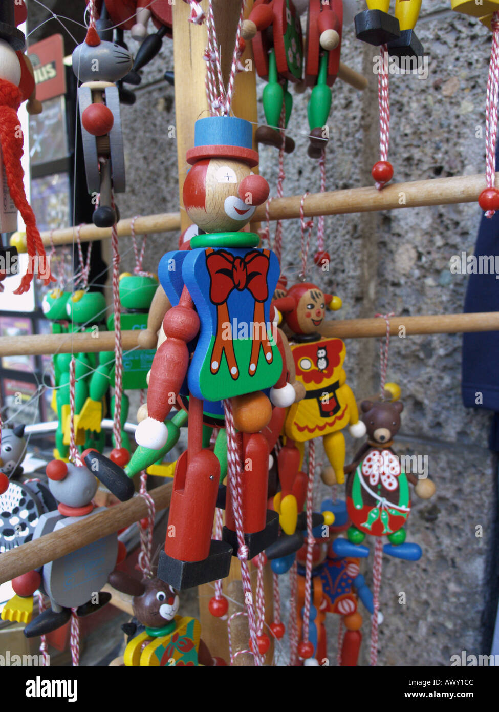 or puppets on sale outside a toy shop in the old town of