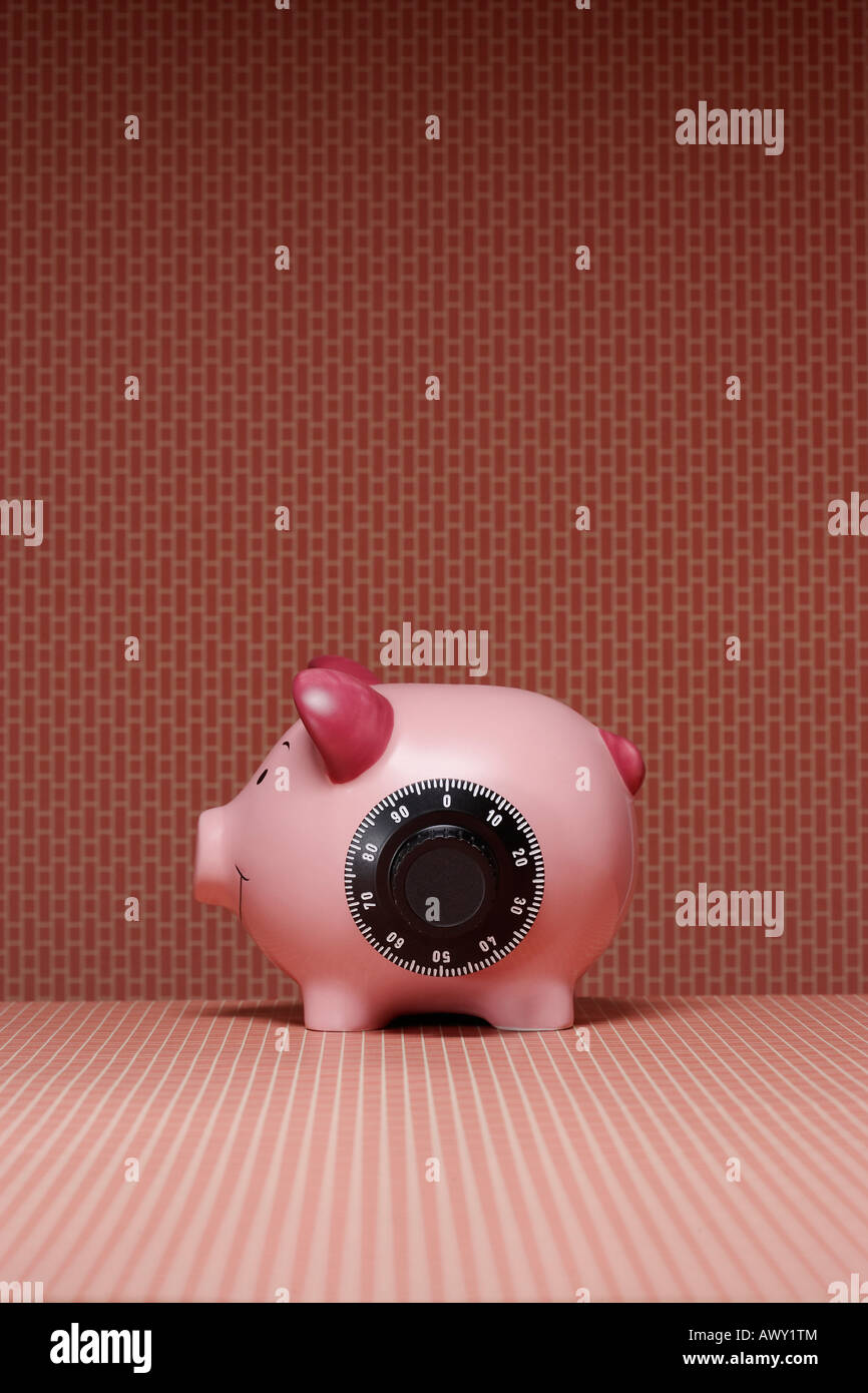 Piggy bank with combination lock, side view Stock Photo Alamy
