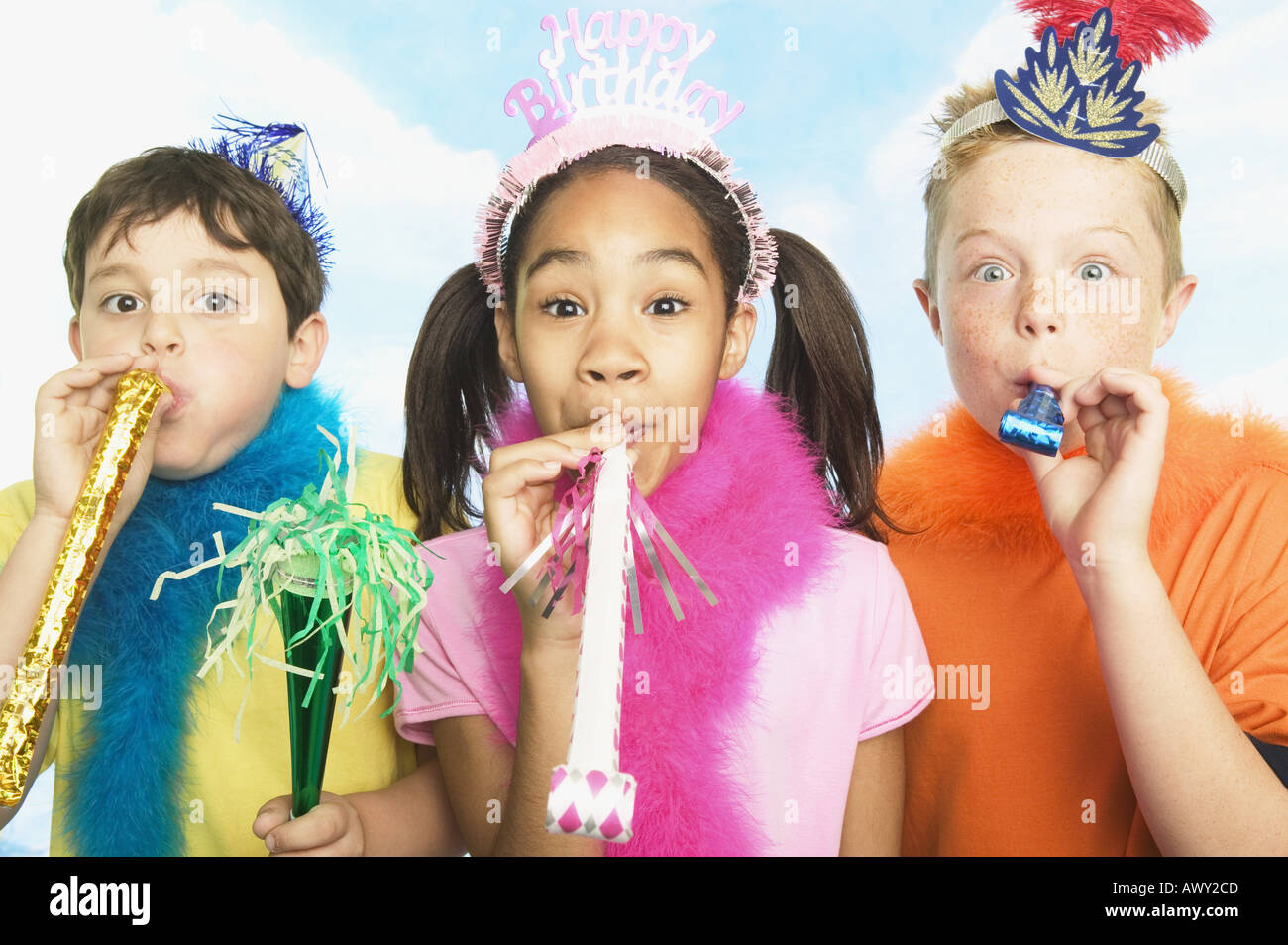Boys and girl in party hats Stock Photo