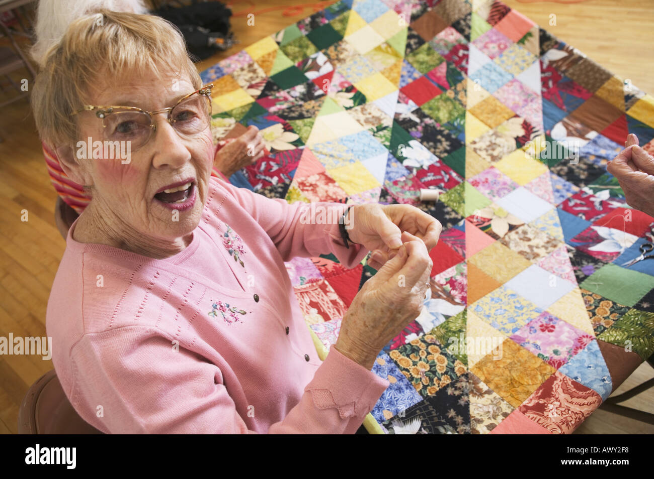 Portrait of a woman quilting Stock Photo