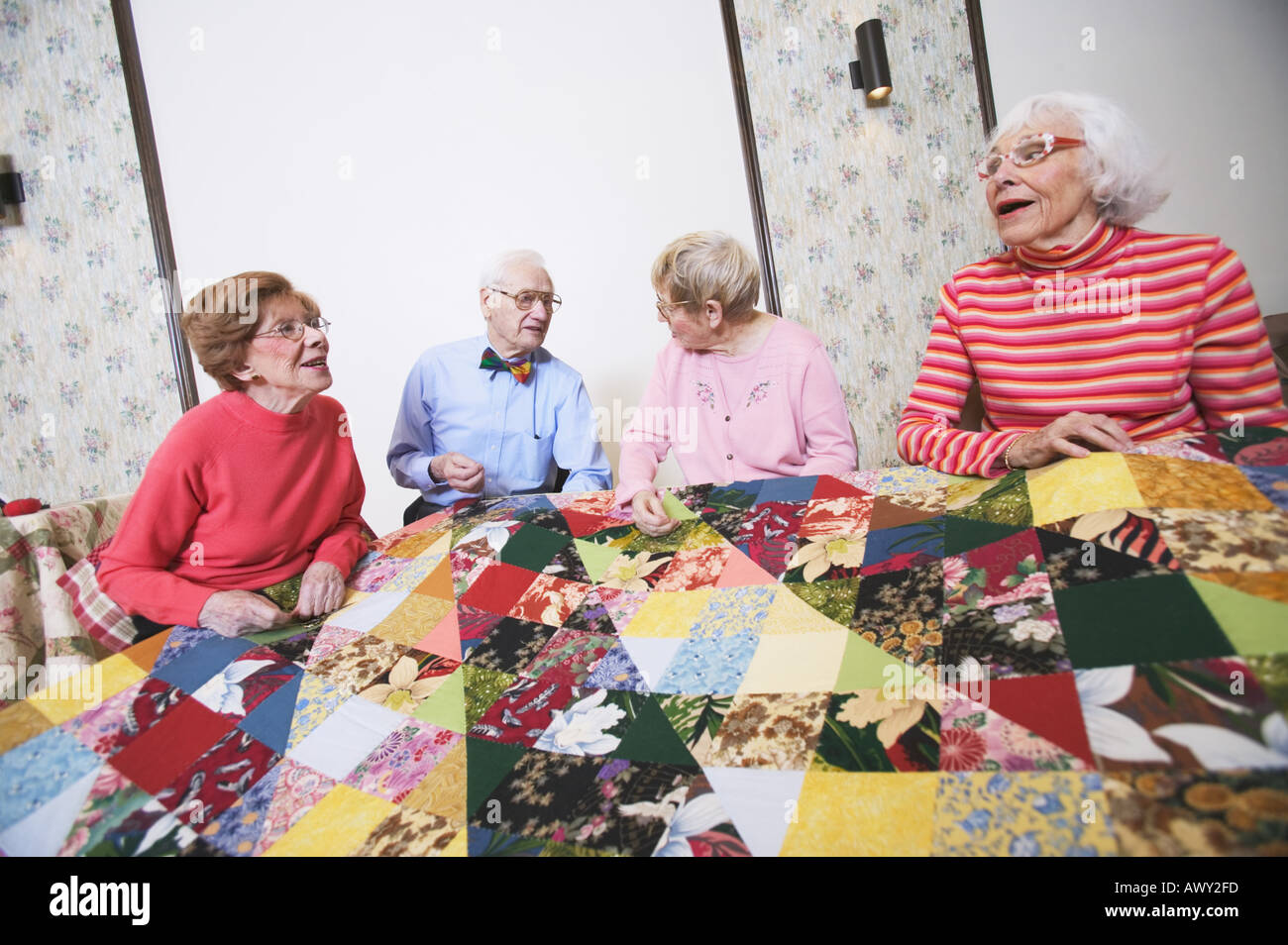 Seniors interacting at a quilting bee Stock Photo - Alamy