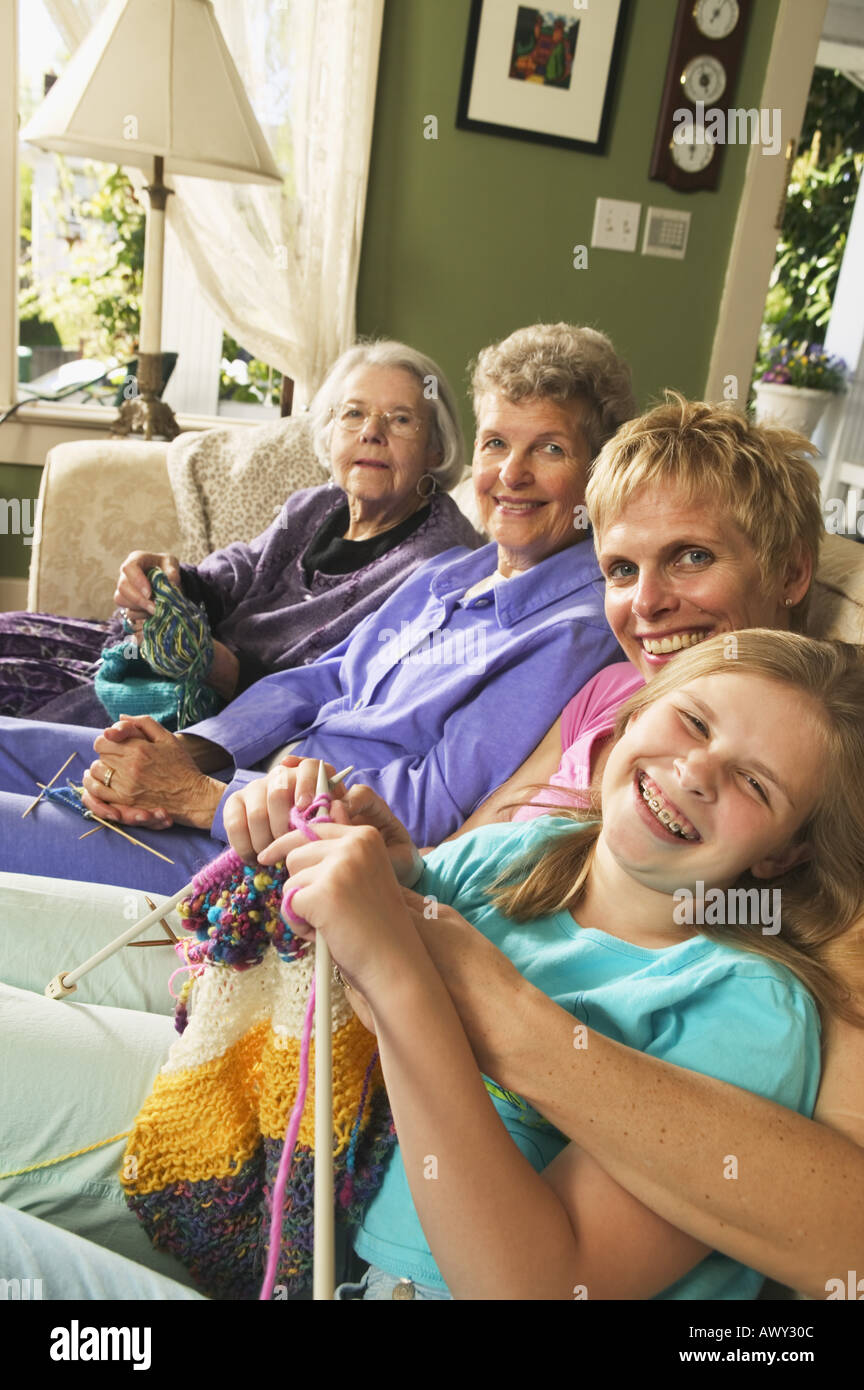 Four generations of females knitting Stock Photo