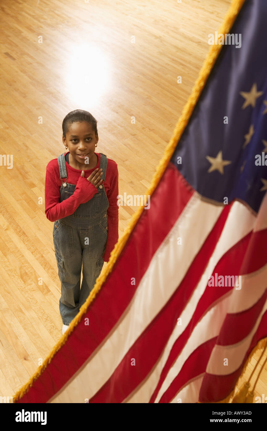 Girl reciting the pledge of allegiance Stock Photo
