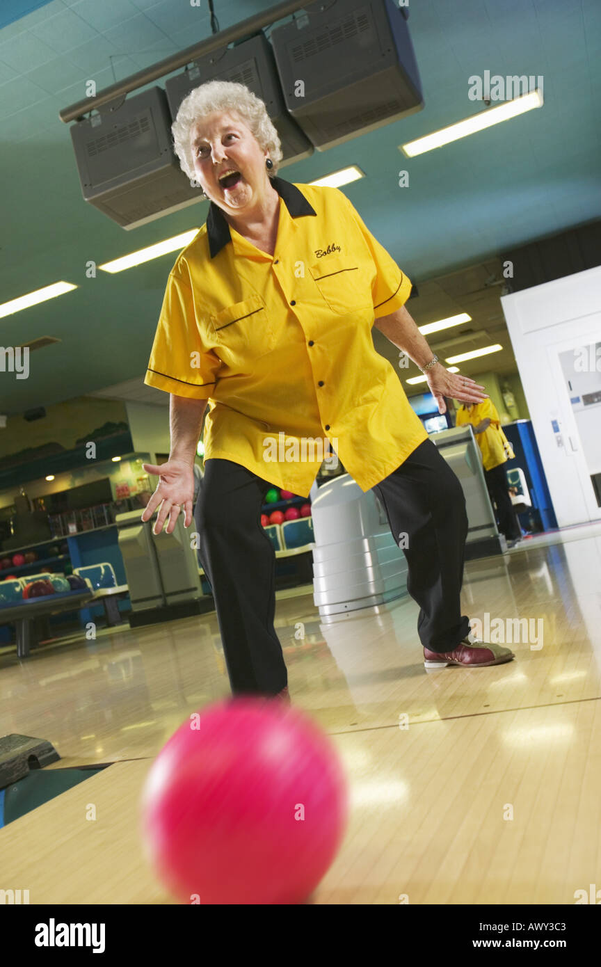 Female bowler rolls a great game Stock Photo