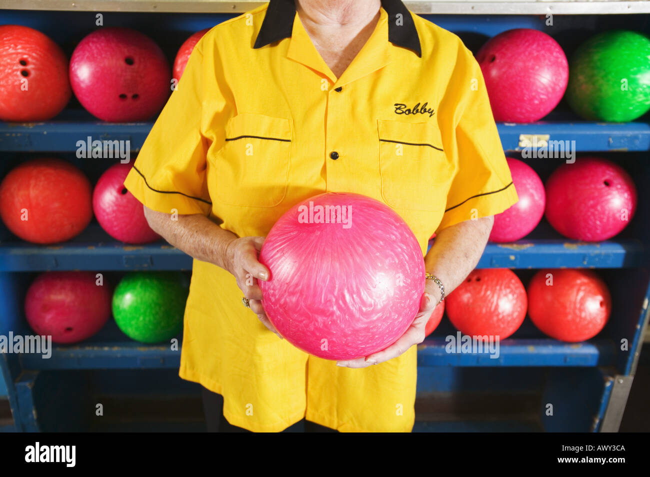 A colorful female bowler Stock Photo