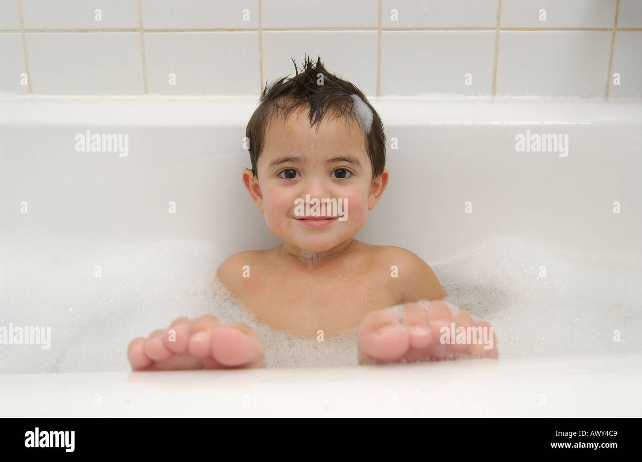 Toddler taking a bath Stock Photo Alamy